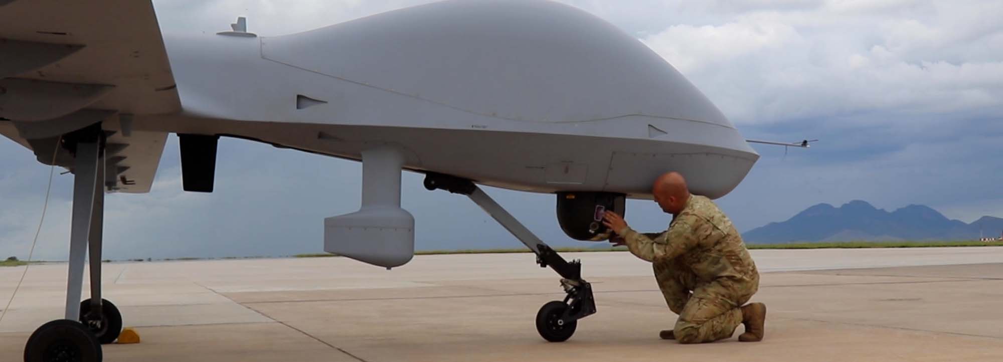 3rd Combat Aviation Brigade, pre-flights the MQ-1C Grey Eagle unmanned aircraft system.